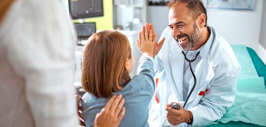 Doctor high-fiving patient